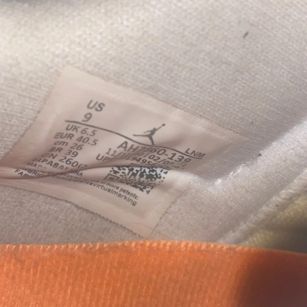 Jordan Women’s White and Orange Sneakers